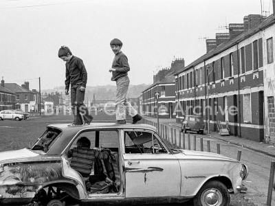 Robin Weaver - Boys on an abandoned car
