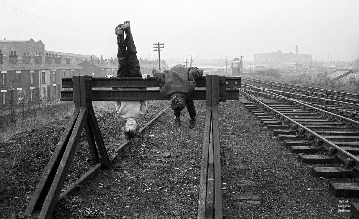 Boys on the rail tracks. Bolton, 1970s.