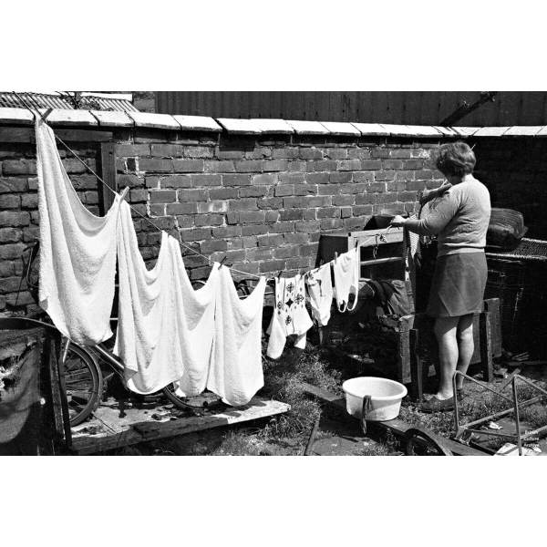 Mrs Cunningham hanging out the washing. Beeton Grove, Longsight, 1970s.