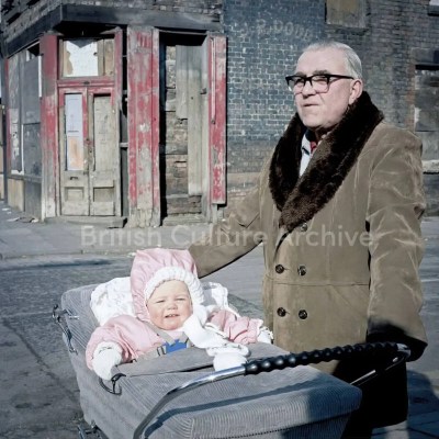 Grandfather and Granddaughter, 1980s - Rob Bremner - Print